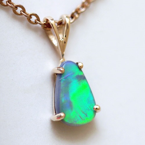 14k Yellow Gold Pendant with a SOLID SEMI BLACK OPAL Broad rolling flash of neon bright fire
